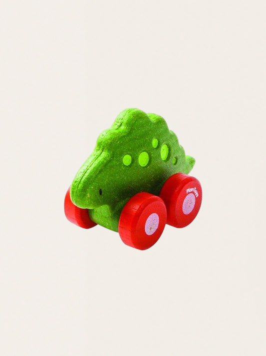 Wooden dinosaur on wheels