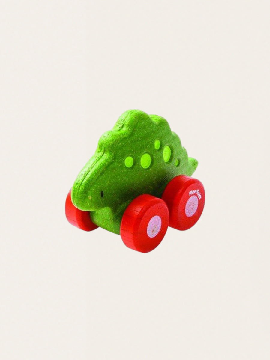 Wooden dinosaur on wheels