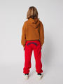 Kids Curve Bobo wählt rote Jogginghosen