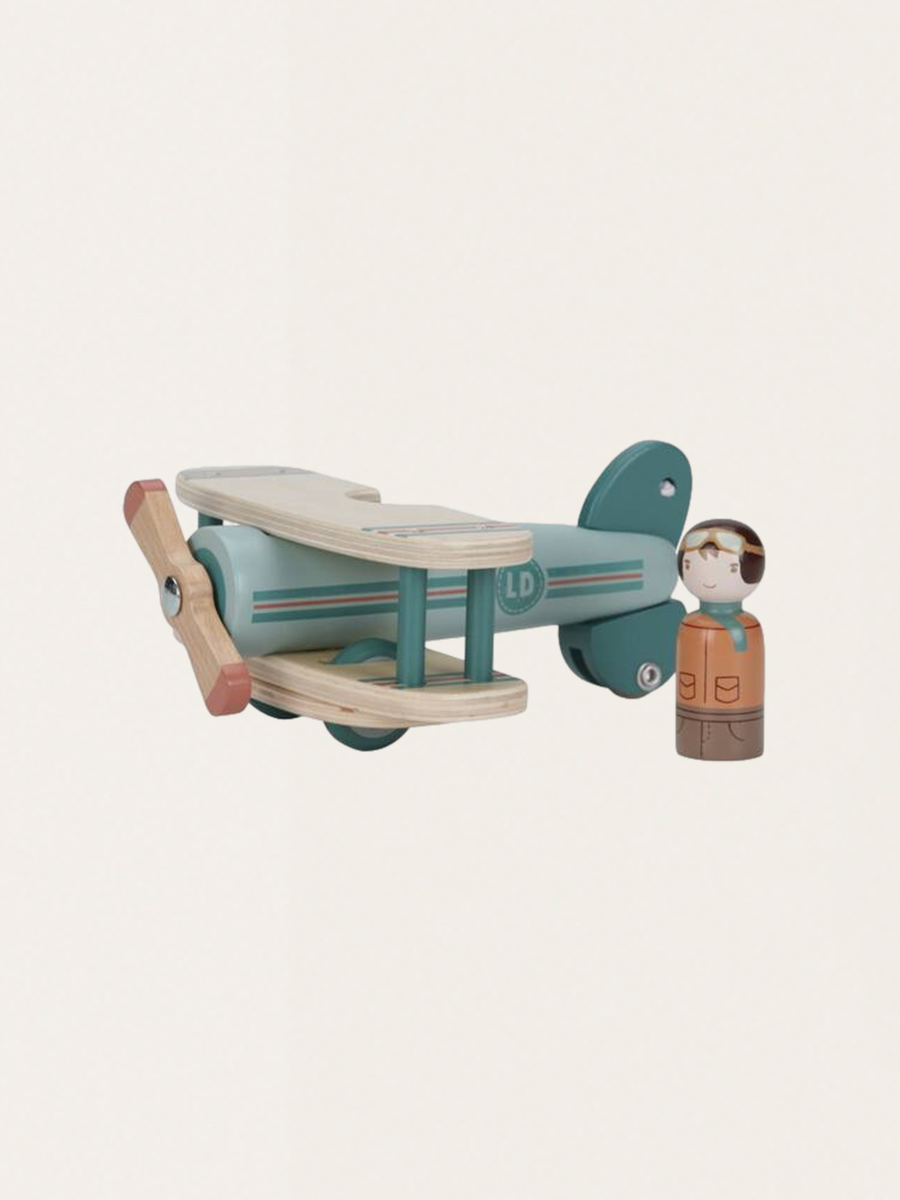 Wooden airplane with a pilot figure
