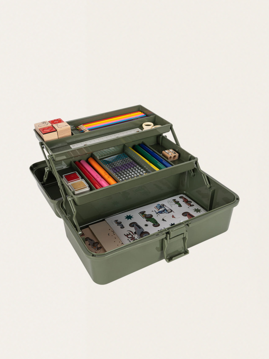 A set of art supplies in a box