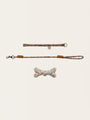 Maileg dog accessories in a metal case