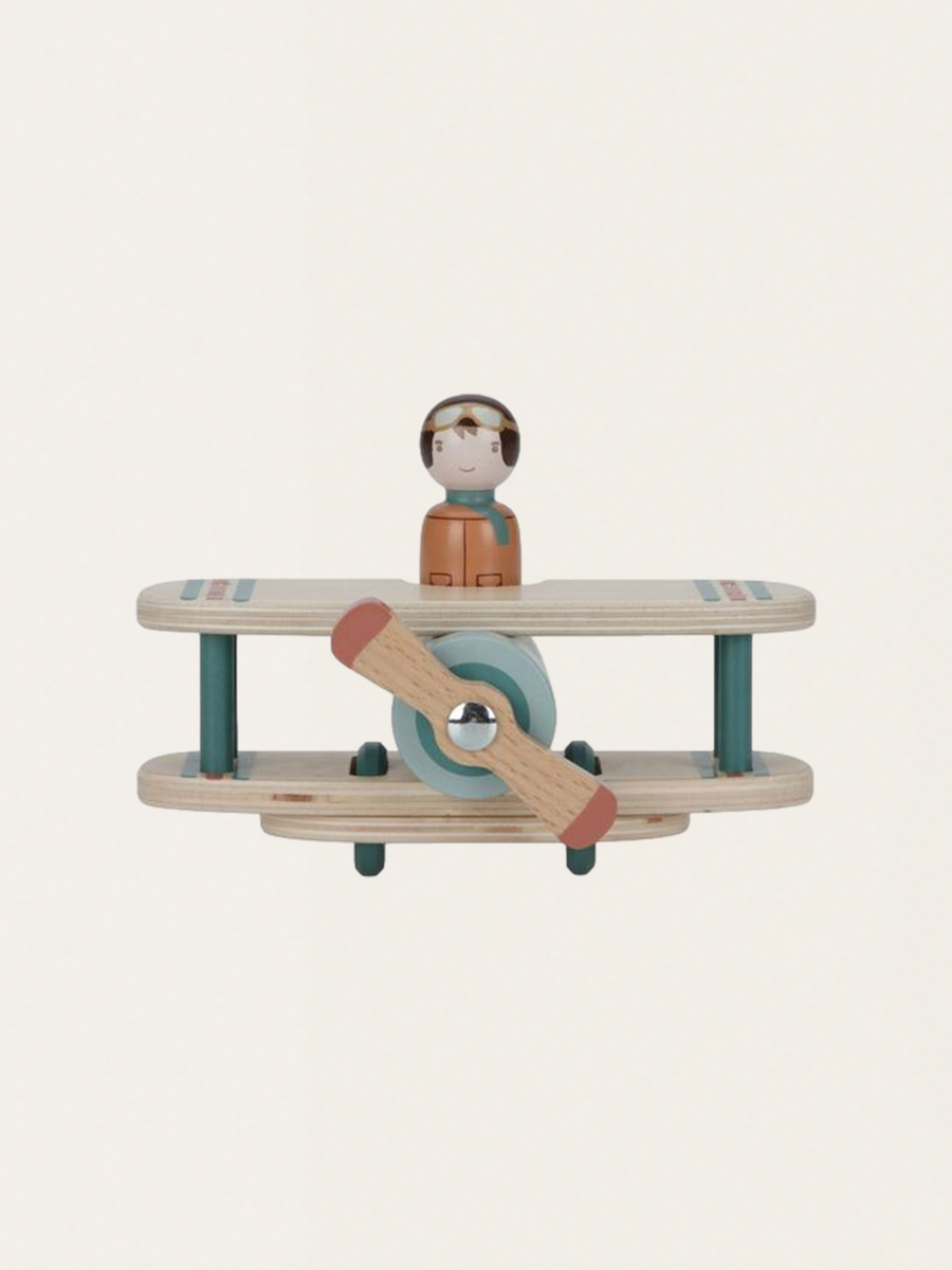 Wooden airplane with a pilot figure