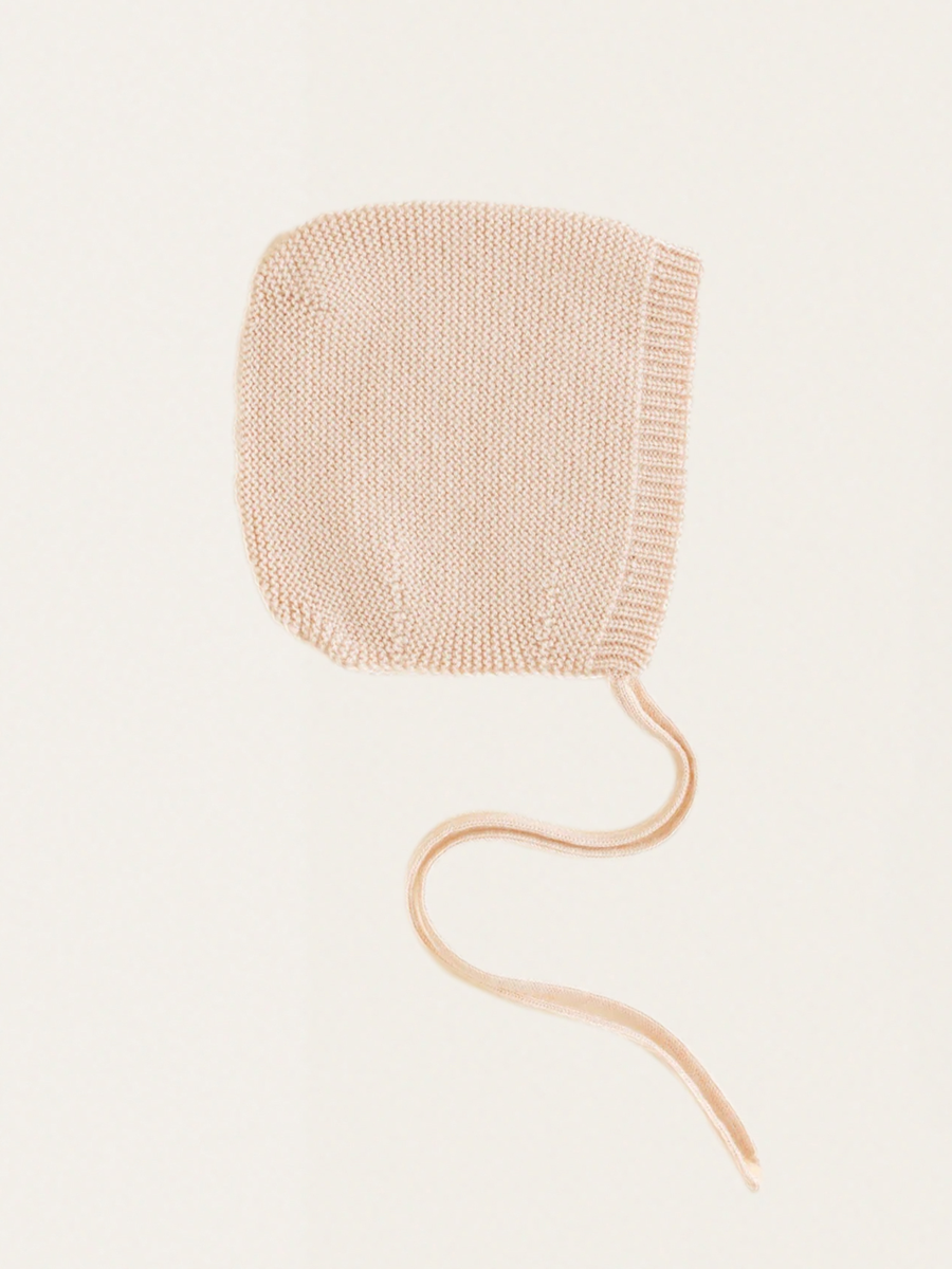 Newborn bonnet made of Italian merino wool Oat