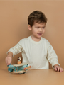 Wooden airplane with a pilot figure