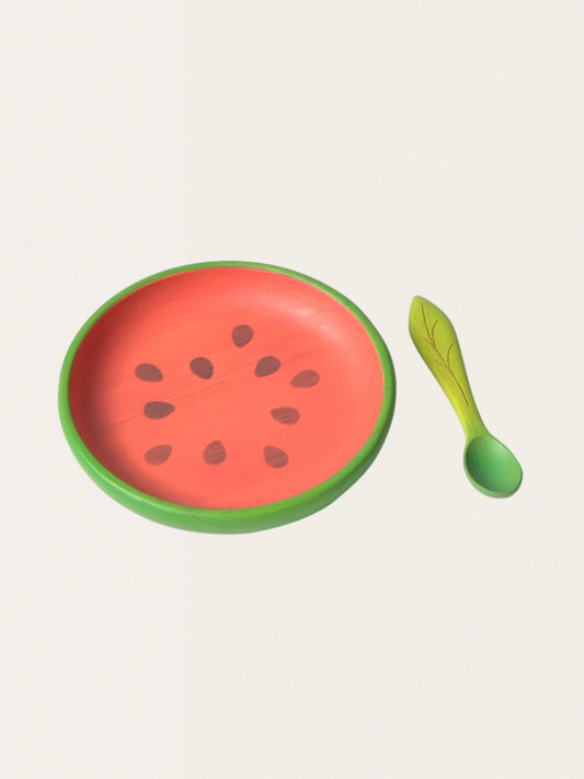 Wooden plate with watermelon spoon