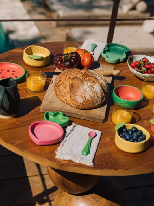 Wooden plate with watermelon spoon