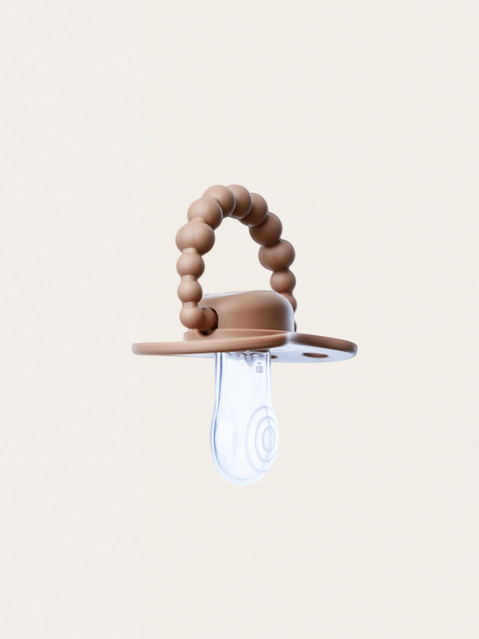 Smoczek pozycjonujący Luu Kids Milk Hazelnut