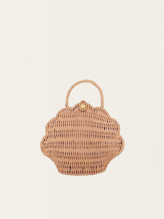 A rattan chest in the shape of a shell