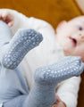 Anti-slip tights for learning to crawl and walk